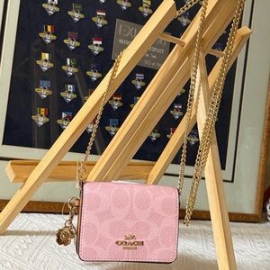 Coach Powder Pink Mini Wallet On A Chain In Signature Canvas With Charms